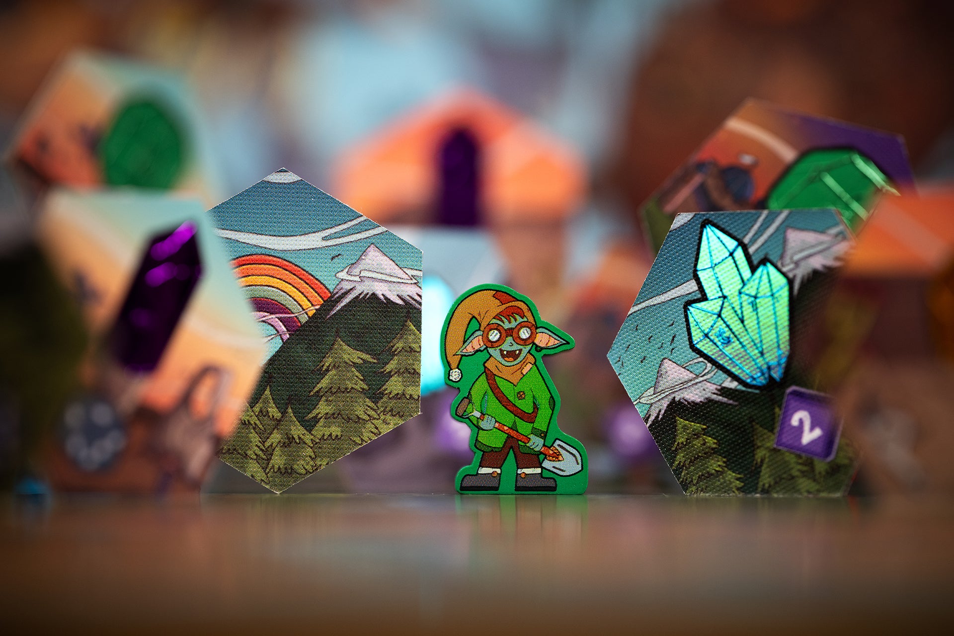 Gems of Iridescia Iridescent Edition - Moja explorer token with deluxe foil-stamped terrain tiles